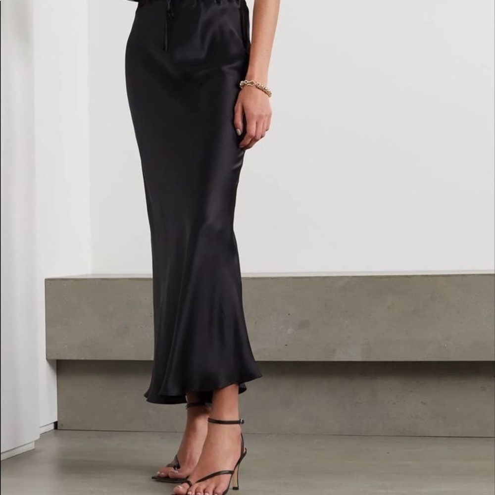 Brand new black silk skirt